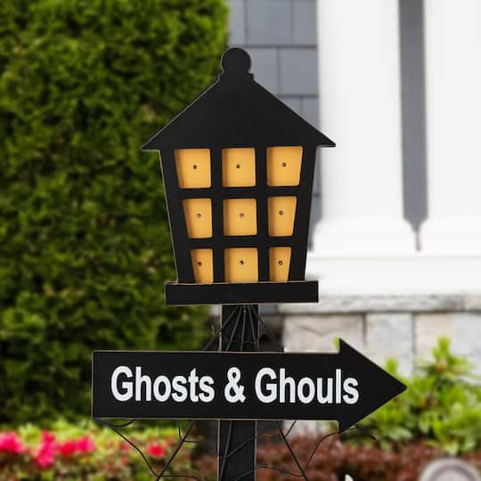 Glitzhome® 42" Lighted Halloween Haunted House Yard Stake with Timer